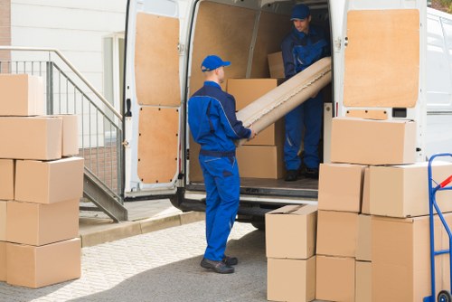 Man with van loading items for a UK move