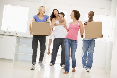 Moving van and packed boxes for a Churchend house removal