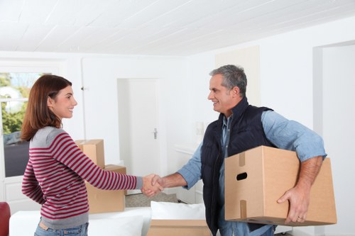 Removal van loading household items for a Churchend move