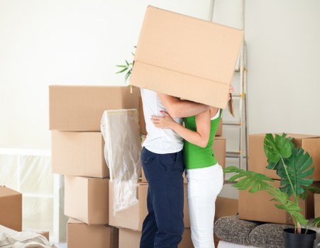 Packing and loading household items for a van move