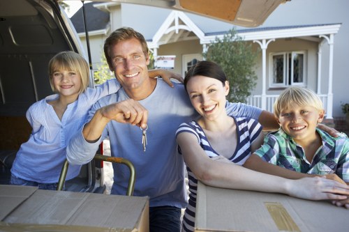 Professional movers handling household furniture during a Churchend relocation