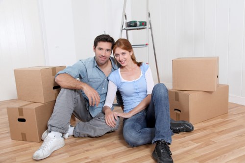 Packed boxes and furniture ready for a home move in Churchend